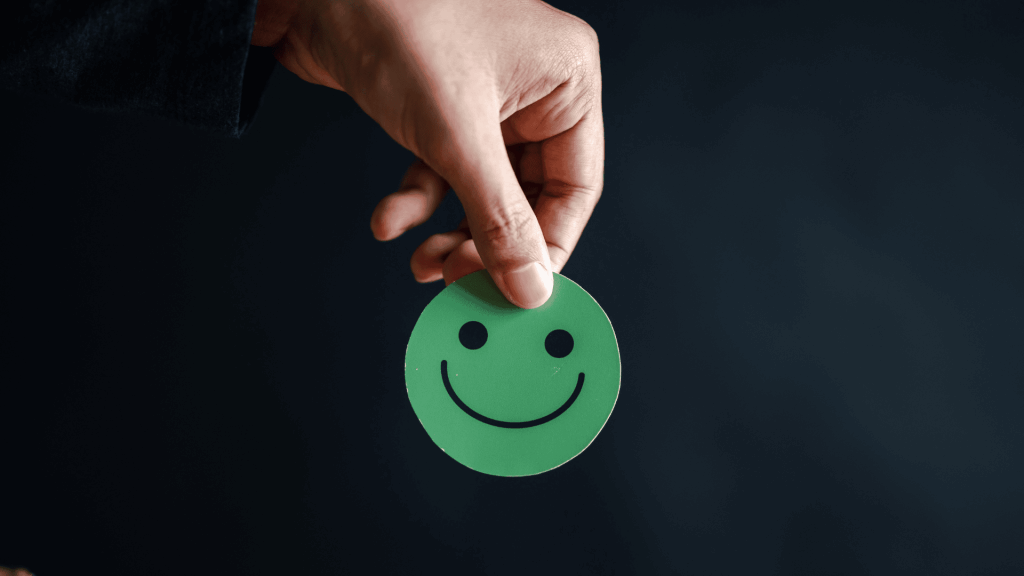 Emoticône vert qui représente les avantages du bilan de compétences